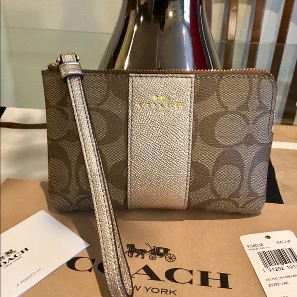 Coach Handbags - COACH WRISTLET KHAKI CHAMPAGNE POUCH